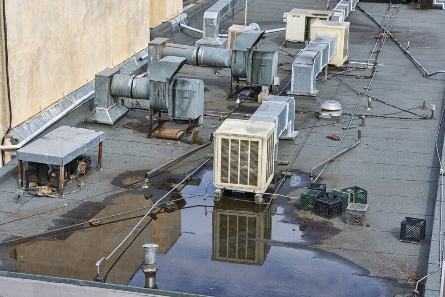 Air conditioning systems on roof of commercial buildings.