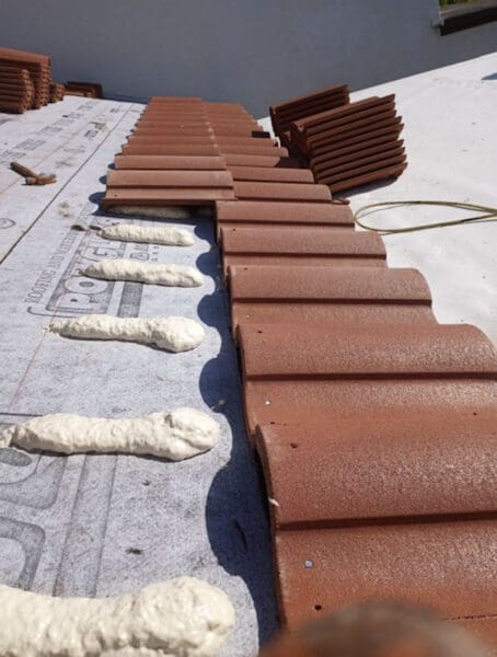 Tile that is being installed on a residential roof