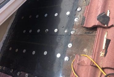 An unfinished tile roof