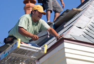 worker working on a roof