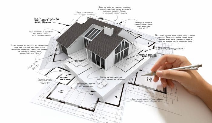 roofing regulations on paper with a home model