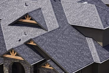 Rooftop in a newly constructed subdivision in Hollywood showing asphalt shingles and multiple roof lines
