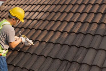 Roofing expert providing roofing services