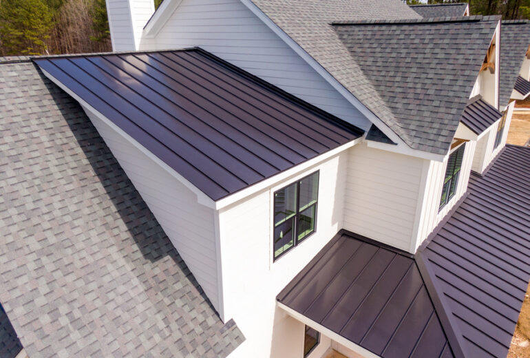 Sunny Daytime Drone Images of a Custom Home in the Final Stages of Construction. It Features a Roof With Architectural Asphalt Shingles